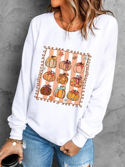 White sweatshirt with pumpkin design