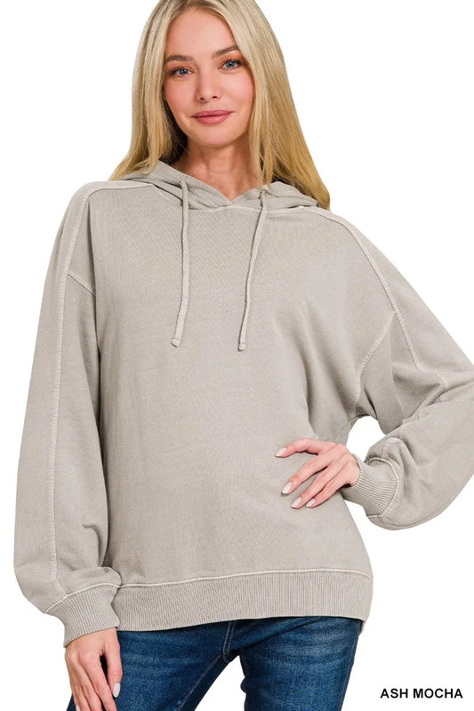 Woman wearing an ash mocha hoodie
