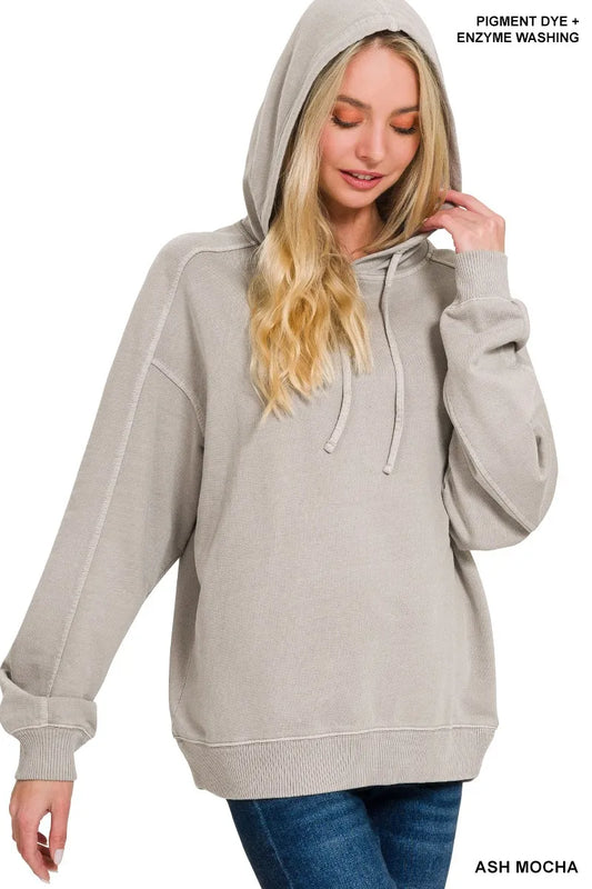 Woman wearing a gray hoodie