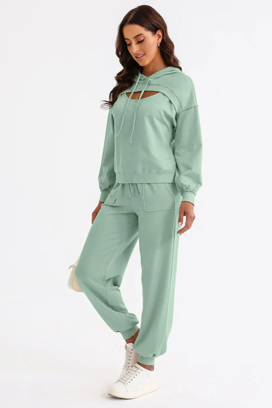 Woman wearing a light green tracksuit